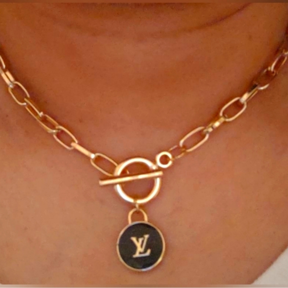 Black gold pendant necklace, brand new